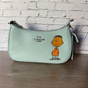 NWT Coach X Peanuts Teri Shoulder Bag WithFranklin CBJ80 Brand New price is firm